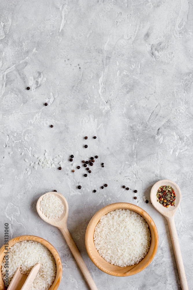 rice for paella on stone background top view mock up