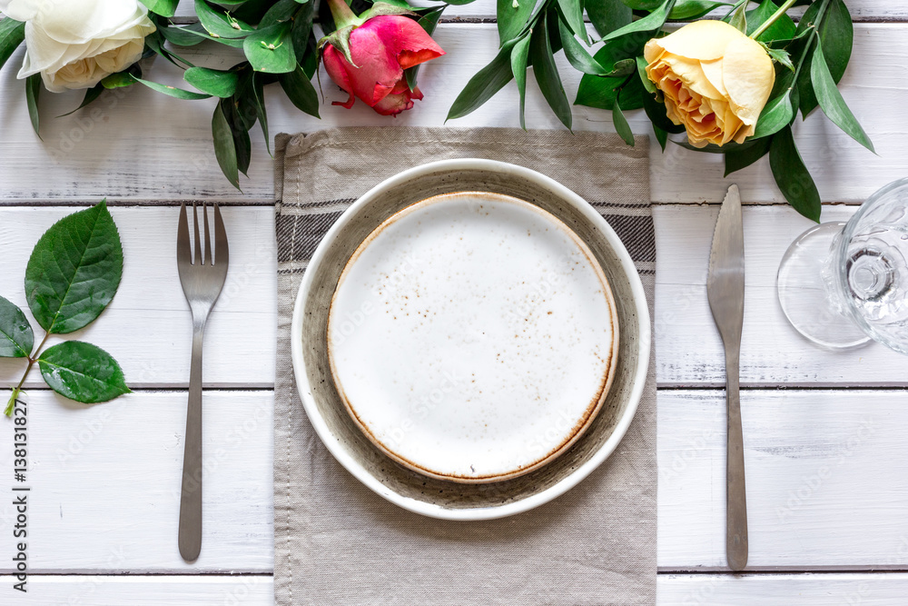 ceramic tableware top view on wooden background mock up