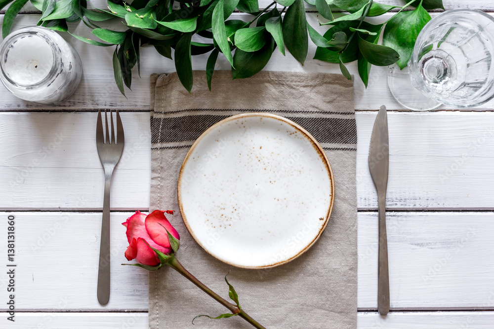 ceramic tableware top view on wooden background mock up