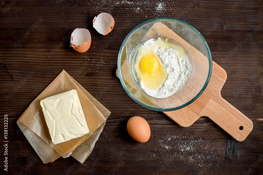 cooking pancake on wooden background top view ingredients for making