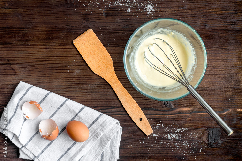 cooking pancake on wooden background top view ingredients for making