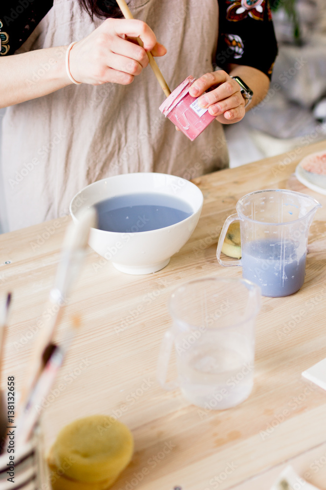 workshop production of ceramic tableware product painting