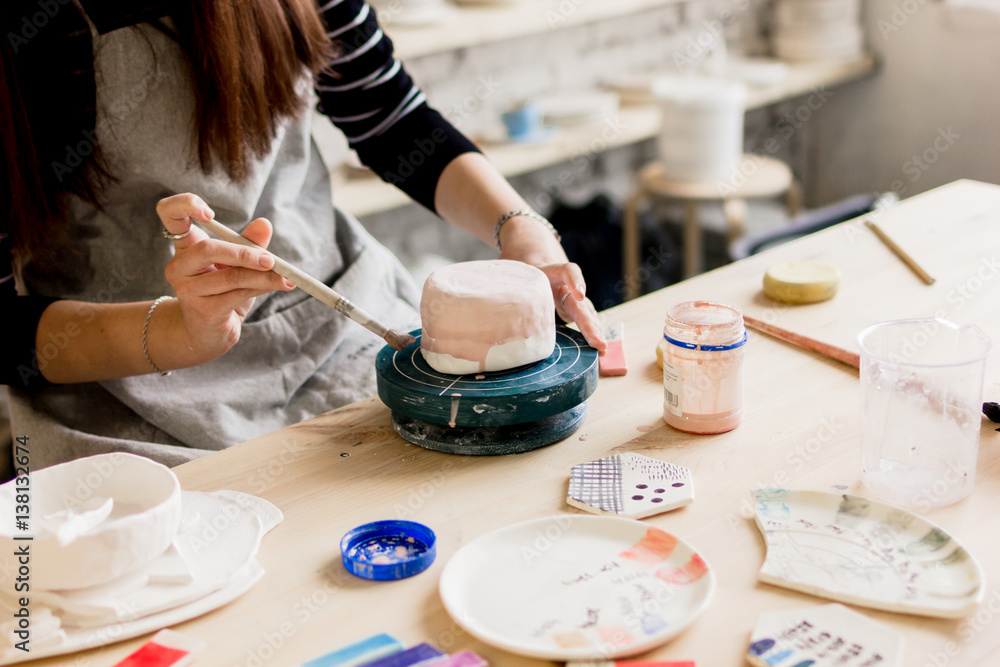 workshop production of ceramic tableware product painting