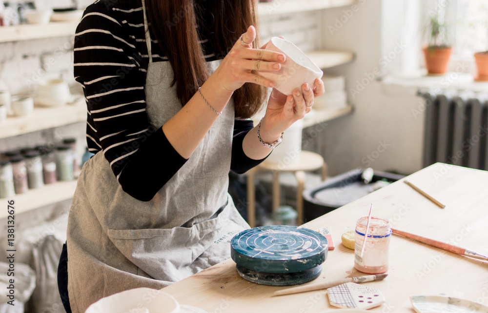 workshop production of ceramic tableware product painting