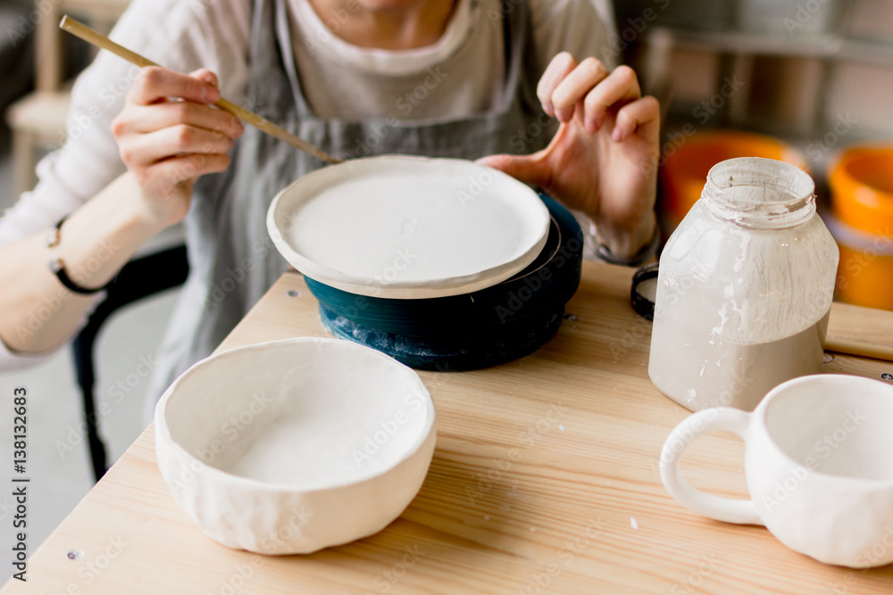 workshop production of ceramic tableware product painting