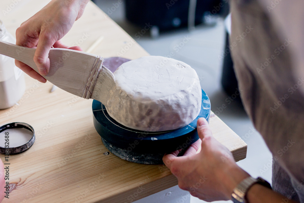 workshop production of ceramic tableware product painting