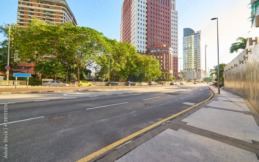 Empty asphalt road and modern buildings in Kuala Lumpur,Malaysia.