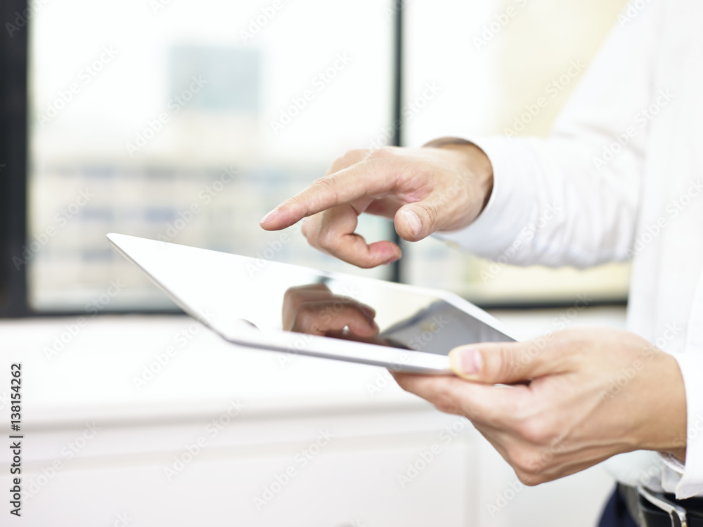 business person using a tablet