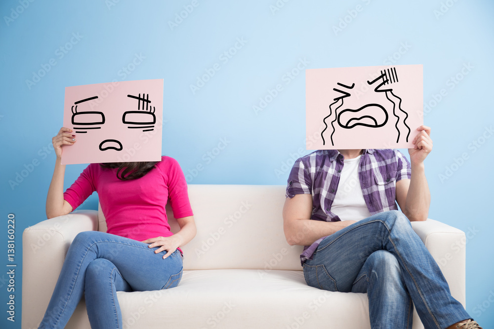 couple hold billboard