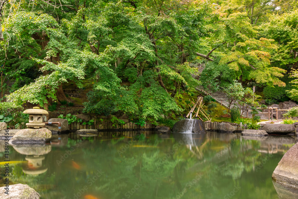 Idyllic pond in the park of Kamakura, Japan