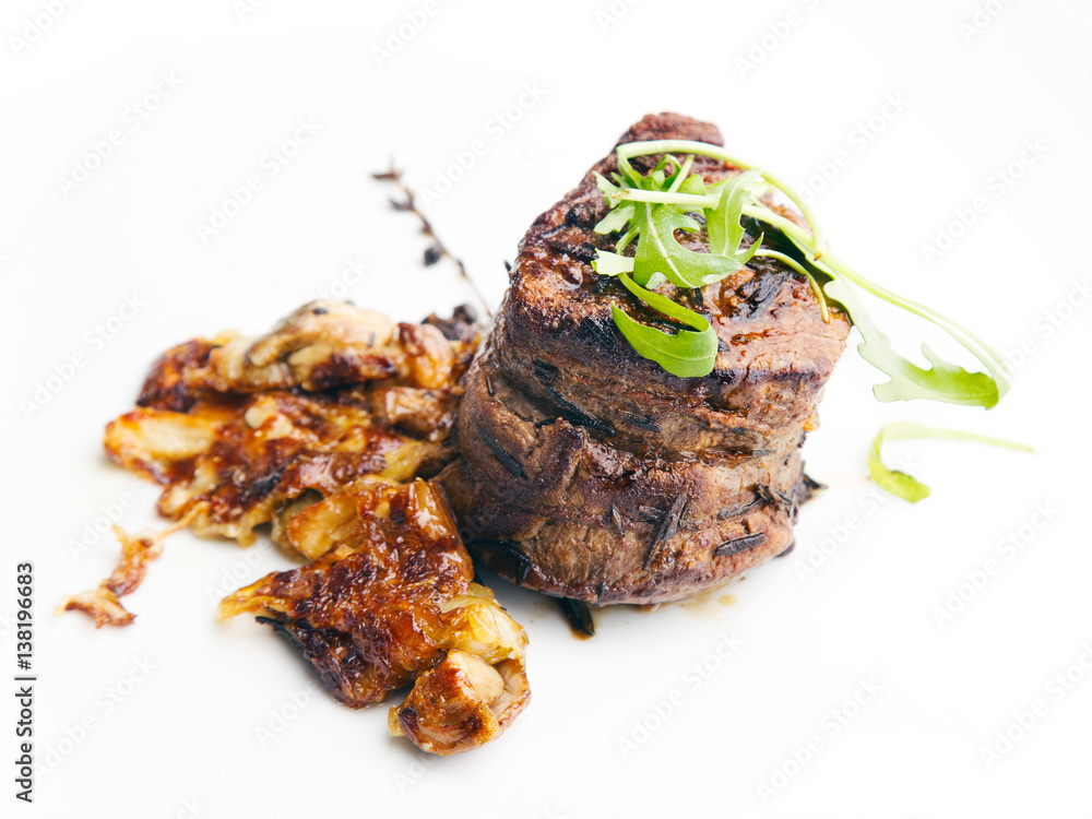 Mignon fillet with muhrooms on plate