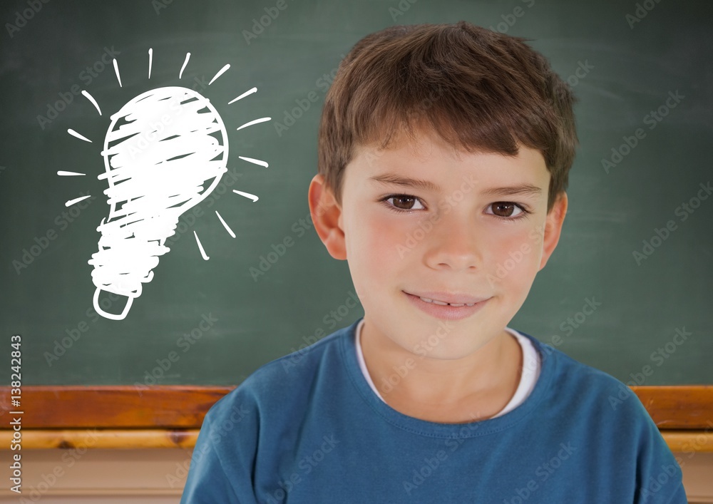 kid and blackboard with lightbulb against a black background