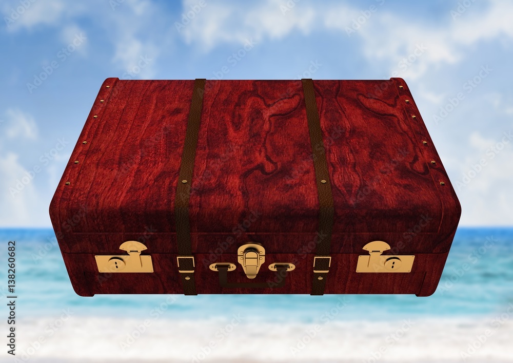 Composite Image of a wood Luggage against a sea background