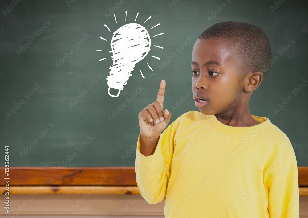 kid and blackboard with lightbulb against a black background