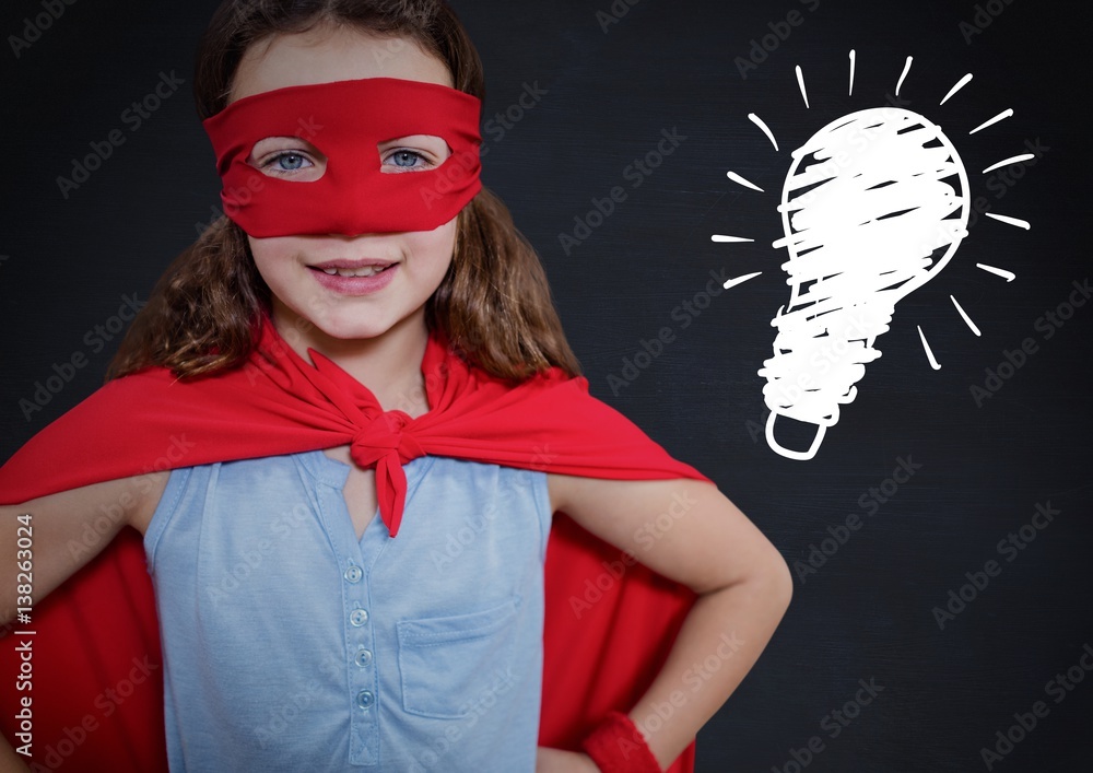 kid and blackboard with lightbulb against a black background