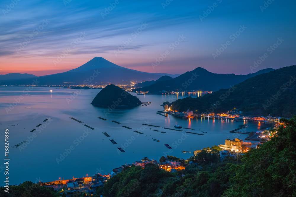 View of Mount Fuji with Suruga bay and Numazu town in twilight time