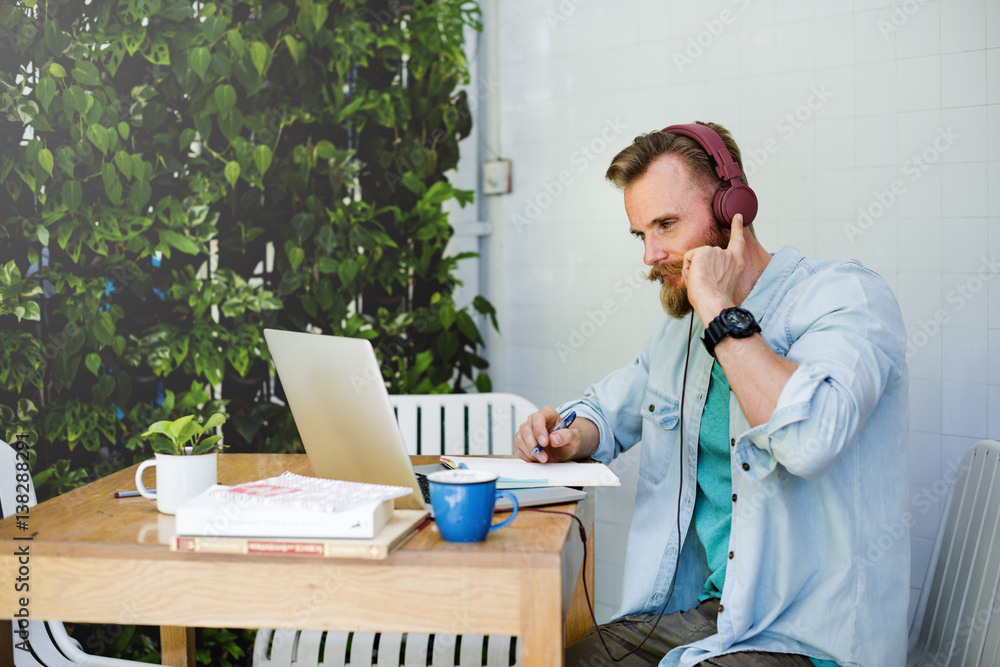 Man Laptop Headphones Music Writing Notebook Technology Concept