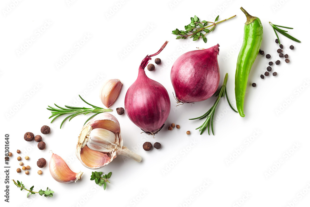 red onions and spices on white background