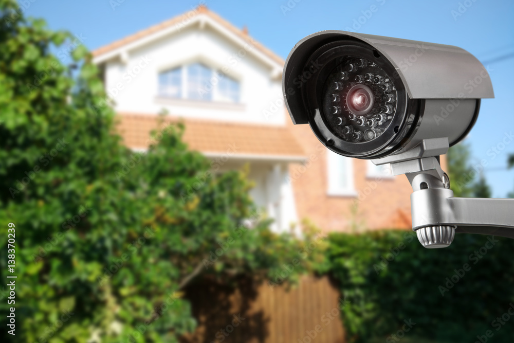 camera and private house on the background