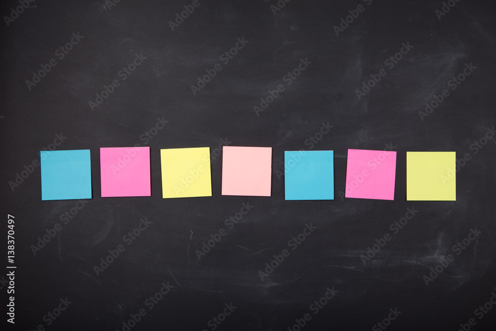 sticky notes on the blank blackboard