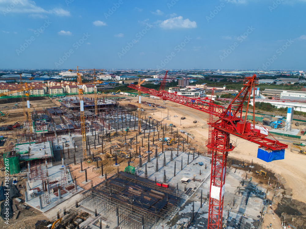 Construction site with cranes. Construction workers are building.Aerial view.Top view.