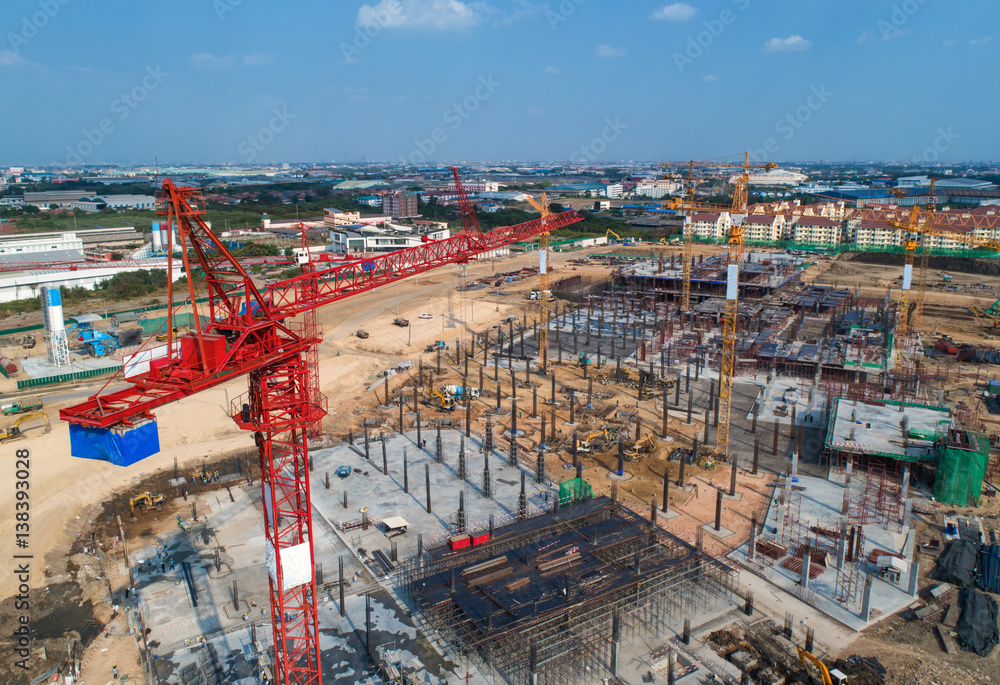 Construction site with cranes. Construction workers are building.Aerial view.Top view.