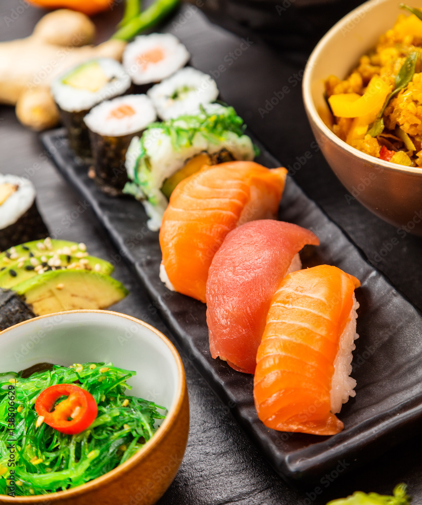 Japanese sushi pieces served on stone