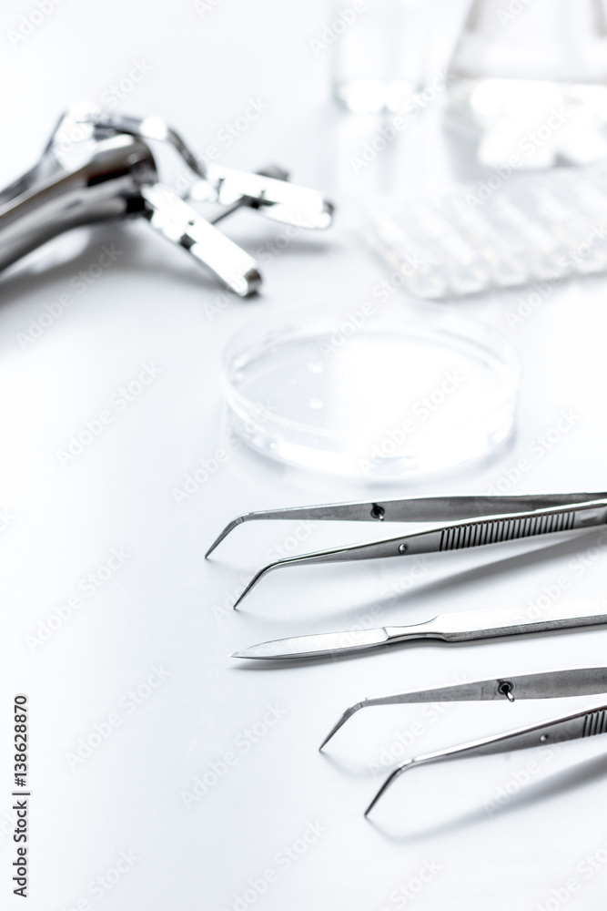 instruments of gynecologist on white background