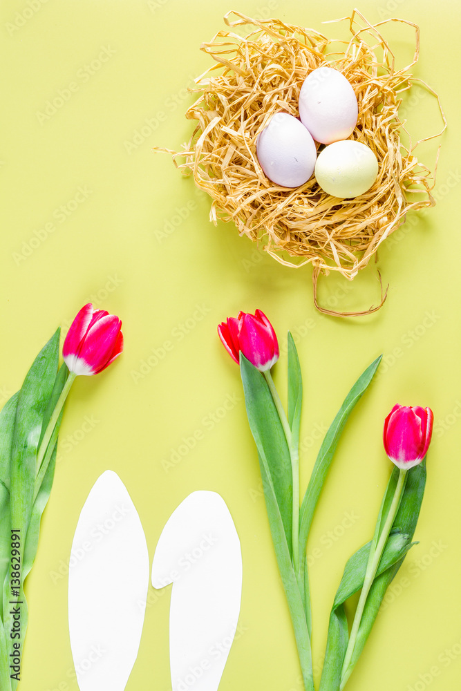 Easter concept on yellow background top view mockup