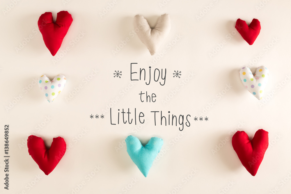 Enjoy The Little Things message with blue heart cushions