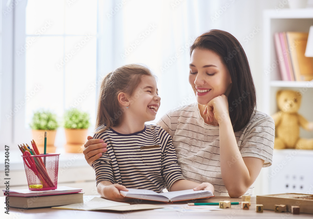 Mom and child reading a book