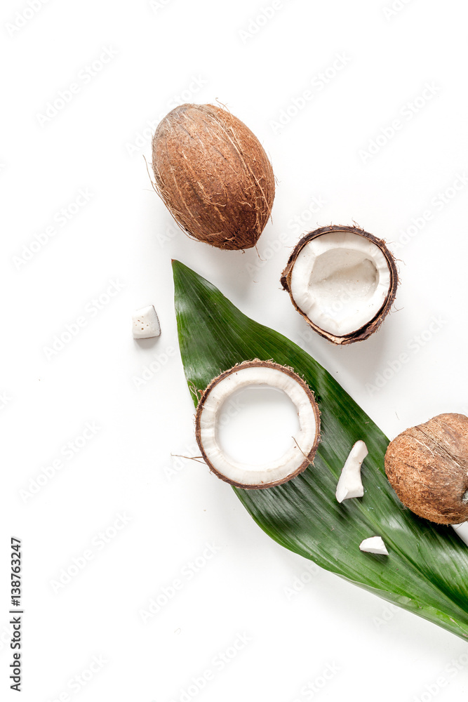 cocktail with coconut on white background top view