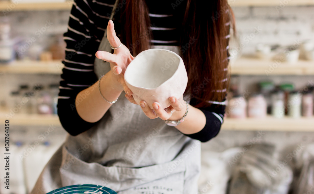 workshop production of ceramic tableware product painting