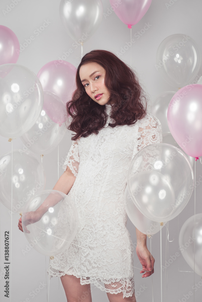 Asian beauty fashion woman with pastel balloons