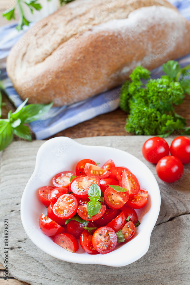 Cherry tomatoes basil salad.