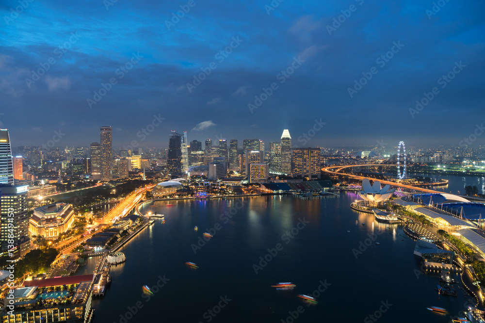 Aerial view of Singapore business district and city at twilight in Singapore, Asia.