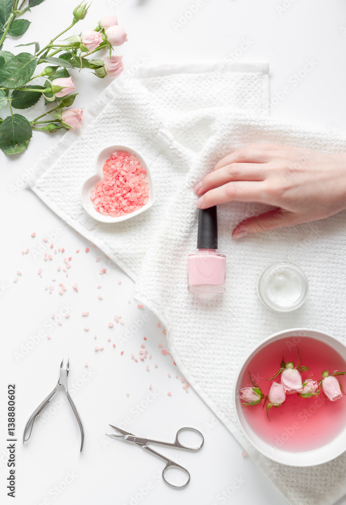 salt and cream for nail care in spa top view