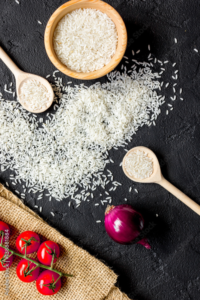 ingredients for paella on dark background top view