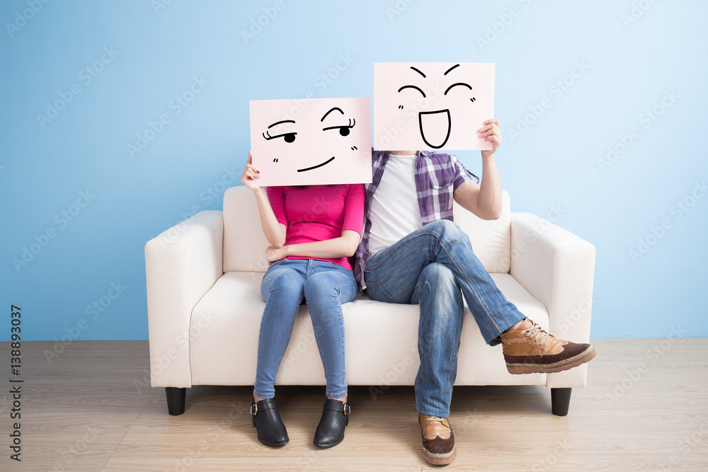 couple hold billboard