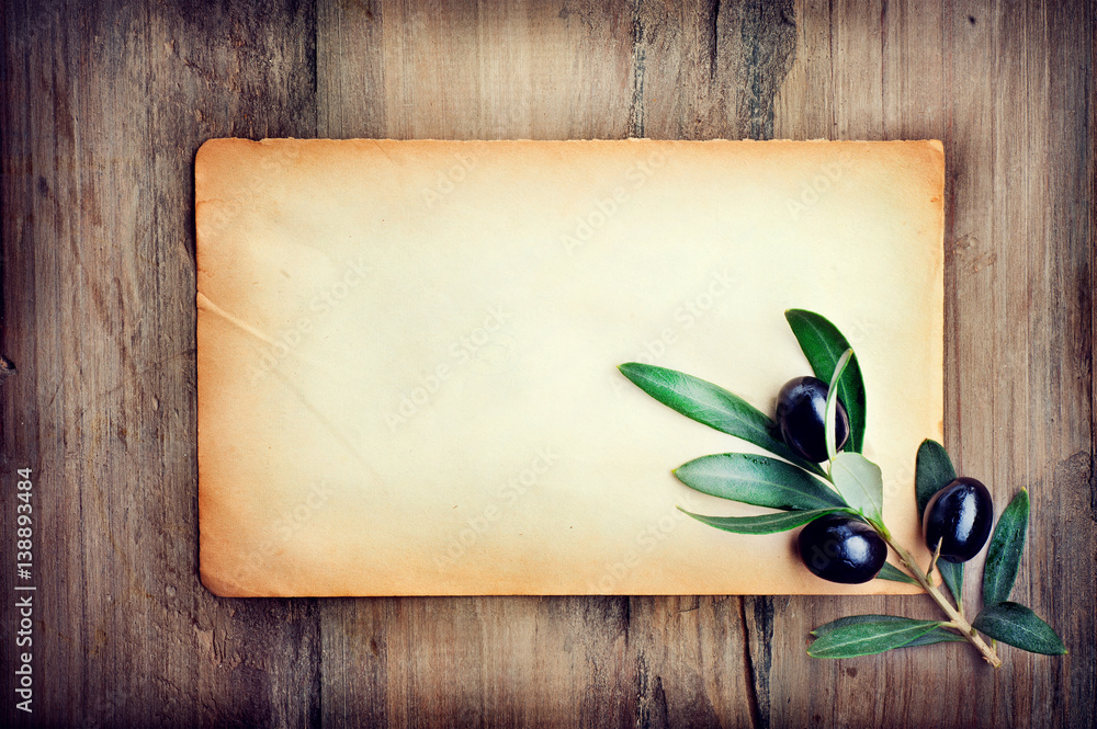 Olive over paper background. Fresh and healthy organic olives border design