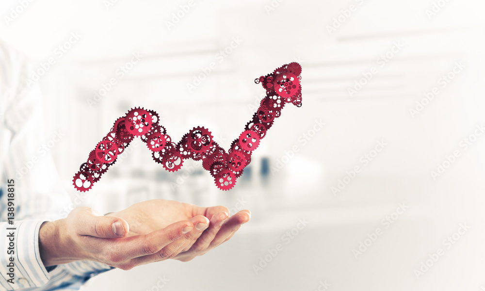 Progressing graph presented in male palms as symbol of success a