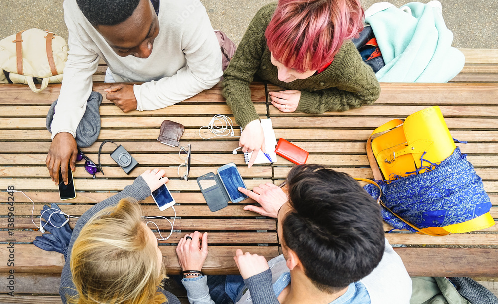 Top view of multiracial friends using mobile smart phone - Addiction concept with young people on ne