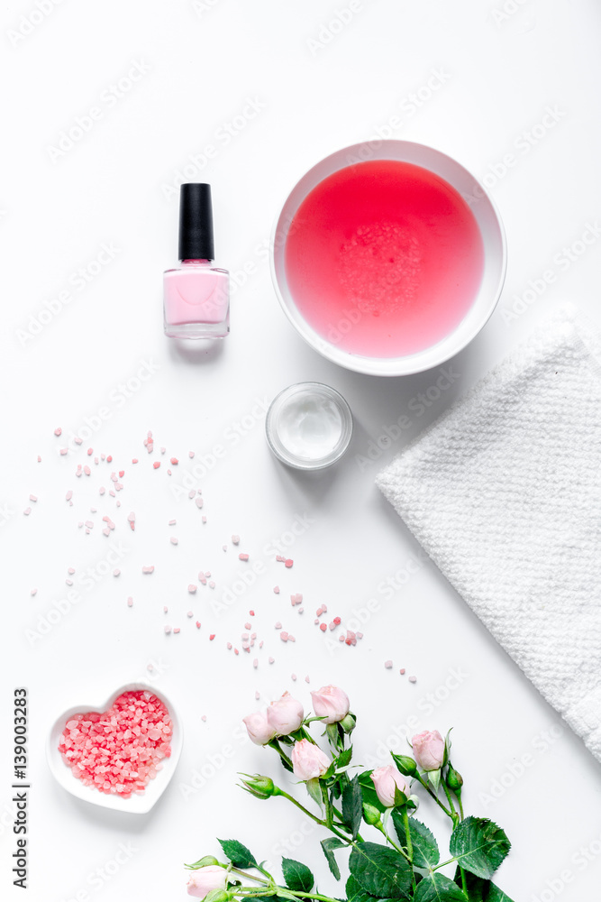 salt and cream for nail care in spa top view