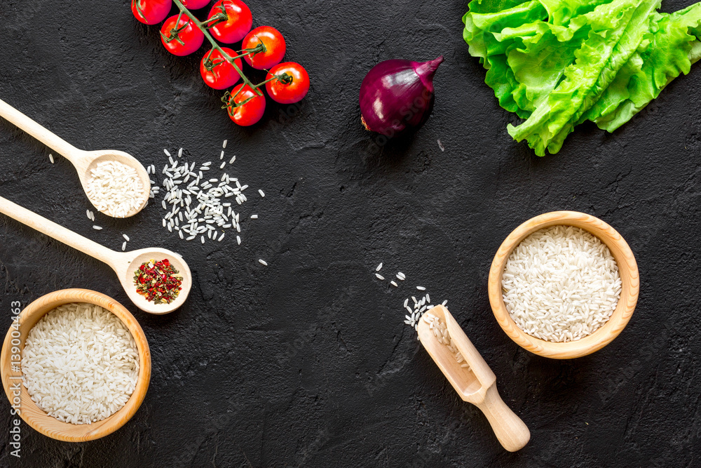 ingredients for paella on dark background top view