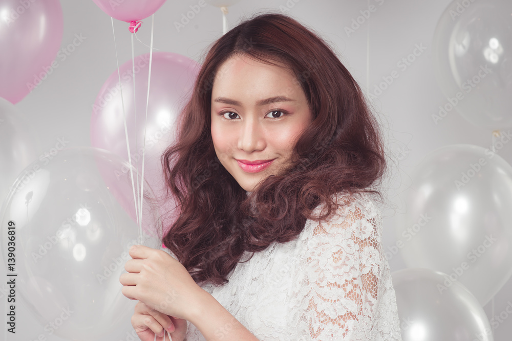 Asian beauty fashion woman with pastel balloons