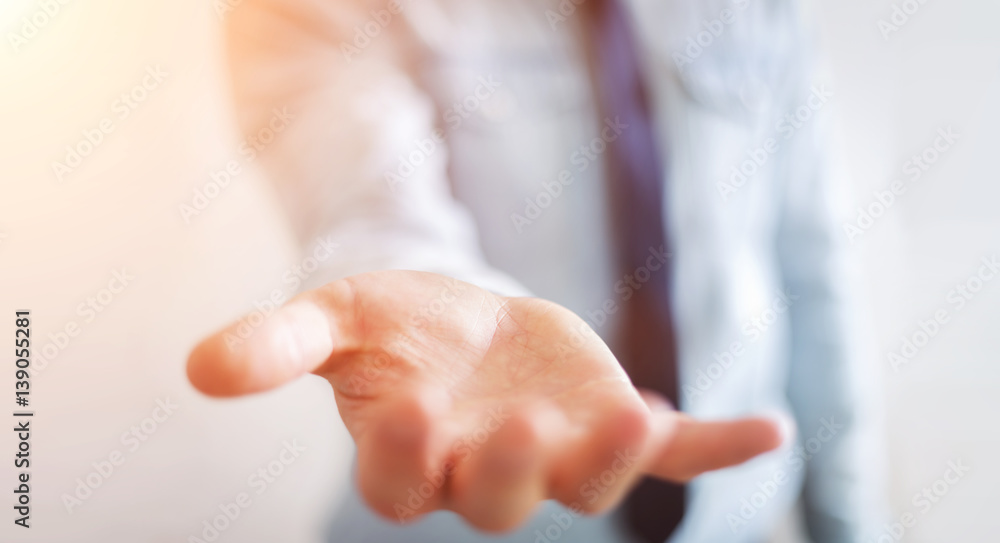 Businessman showing his empty hand