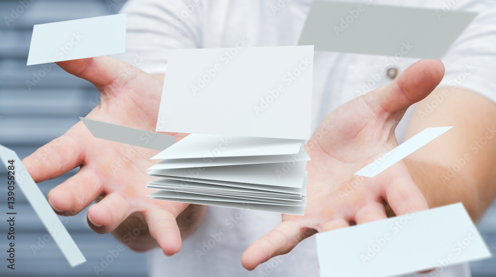 Businessman holding floating business card 3D rendering