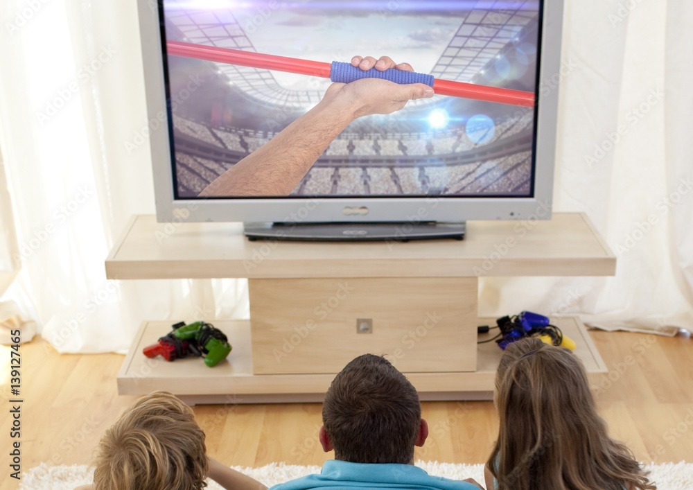 Family watching javelin throw on television at home