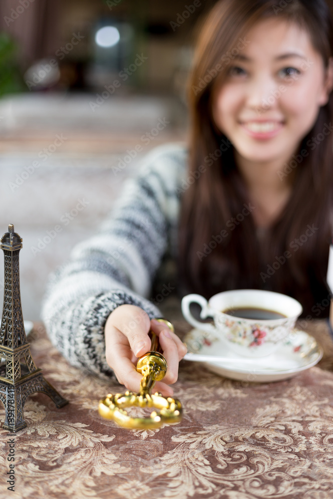 young pretty woman sits in cafe