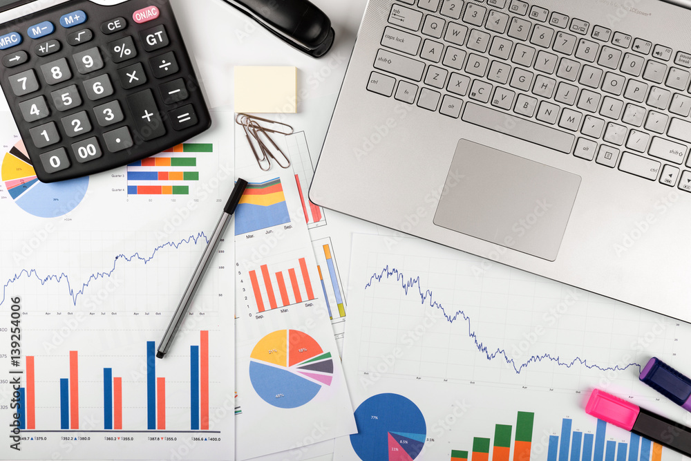 data analysis - workplace with business graphs and charts